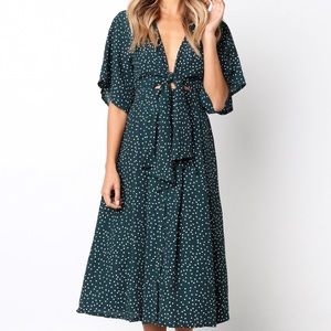 Polka dot hunter green dress.
